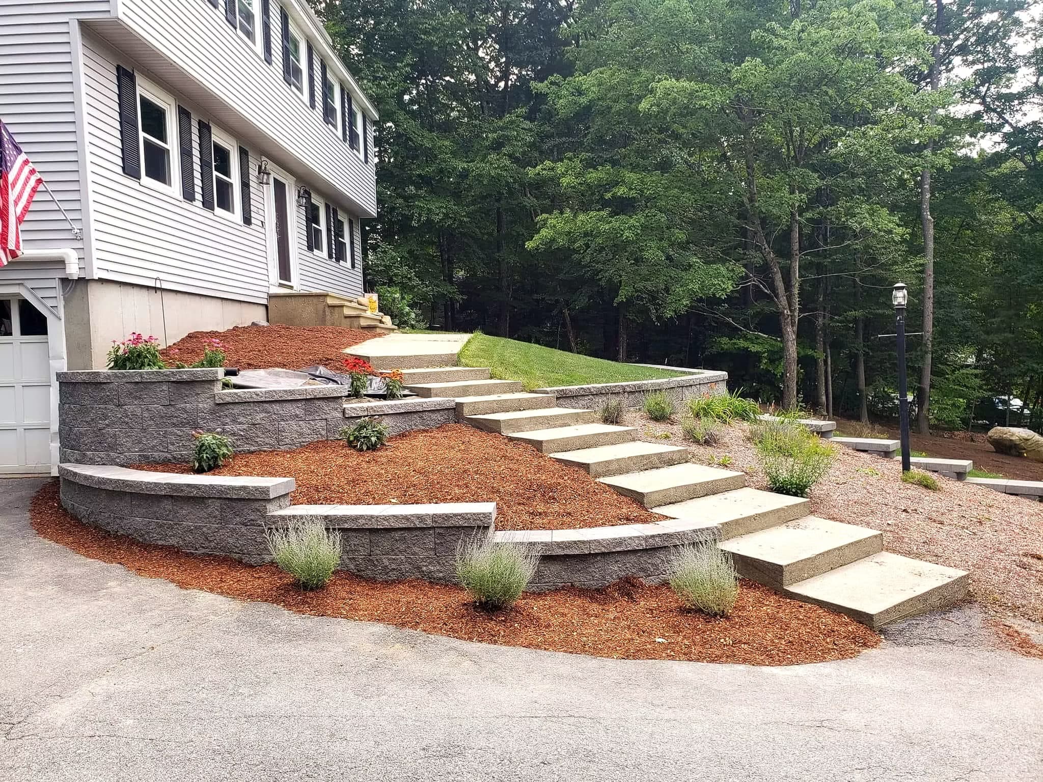 GravityStone Edge retaining wall project showing stepped wall construction