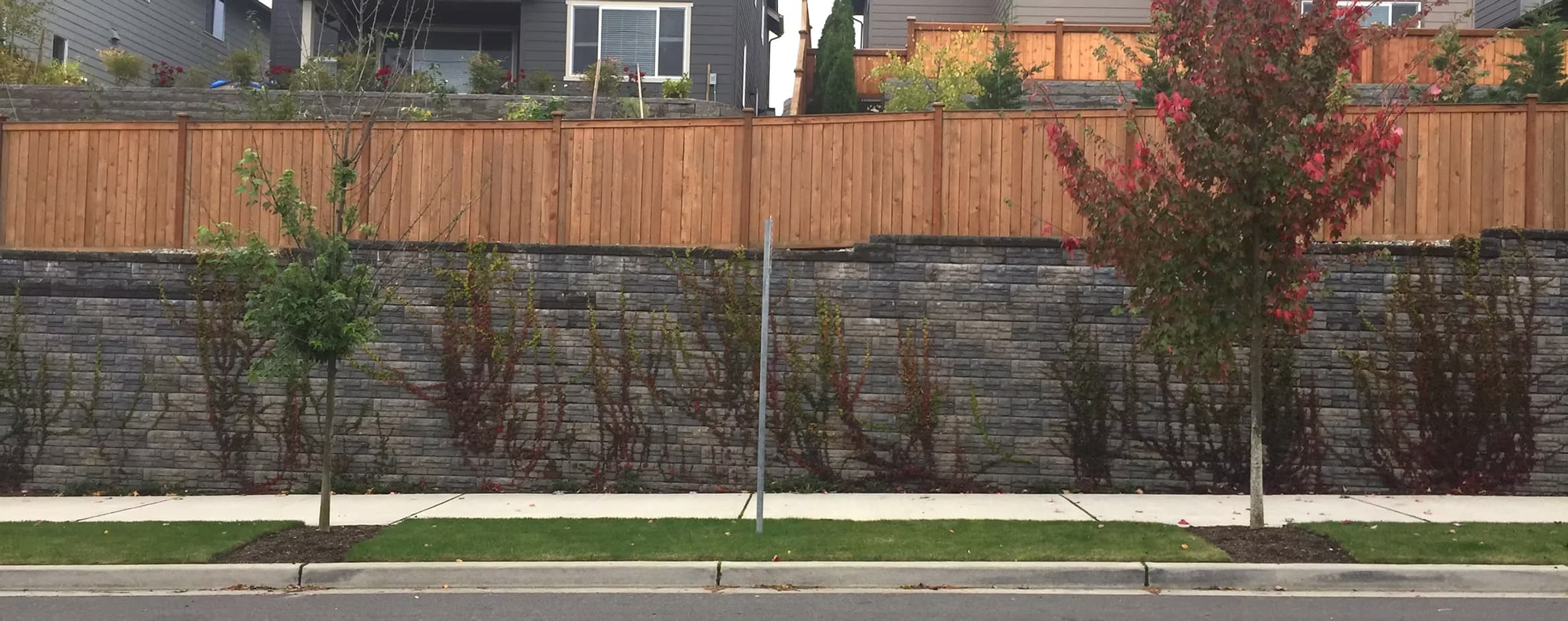 Finished retaining wall project in a residential yard